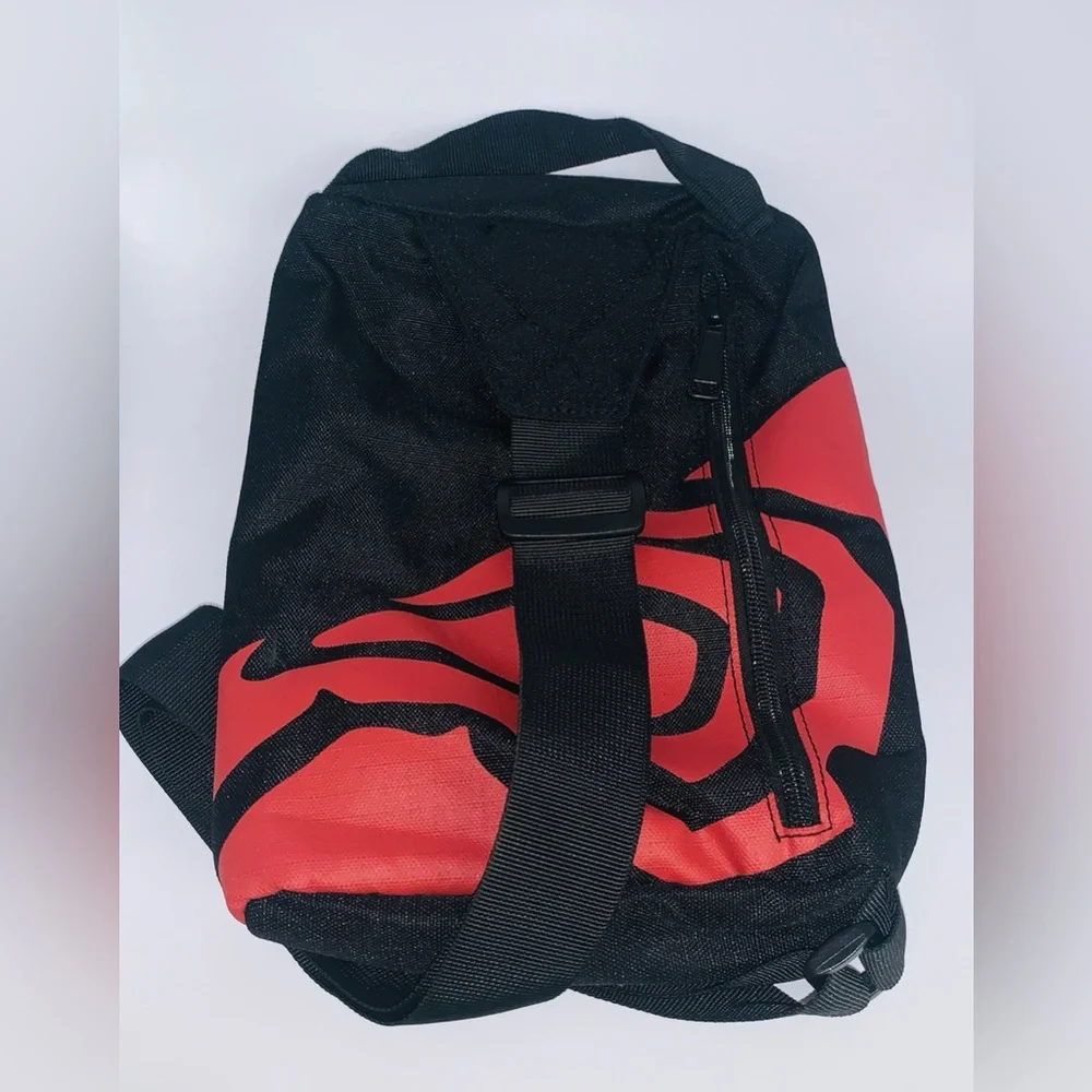 New Chipotle Mexican Grill sling back / backpack / black with red chili … - Picture 3 of 9